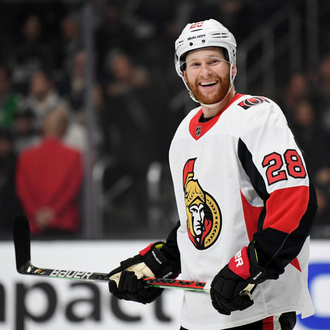 LOS ANGELES, CALIFORNIA - MARCH 11:  Connor Brown #28 of the Ottawa Senators laughs before a face off during the second period against the Los Angeles Kings at Staples Center on March 11, 2020 in Los Angeles, California. (Photo by Harry How/Getty Images)
